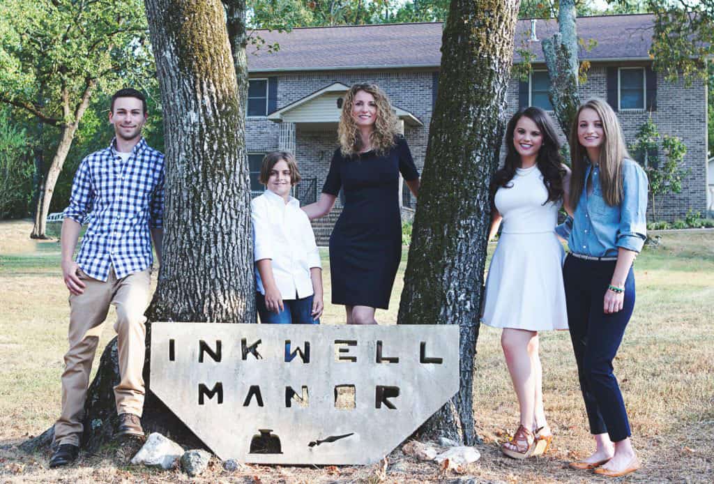 Cara and her children at their house, "Inkwell Manor"