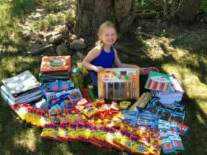 Lily collecting school supplies for kids in need