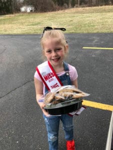 Lily delivering dinner to first responders